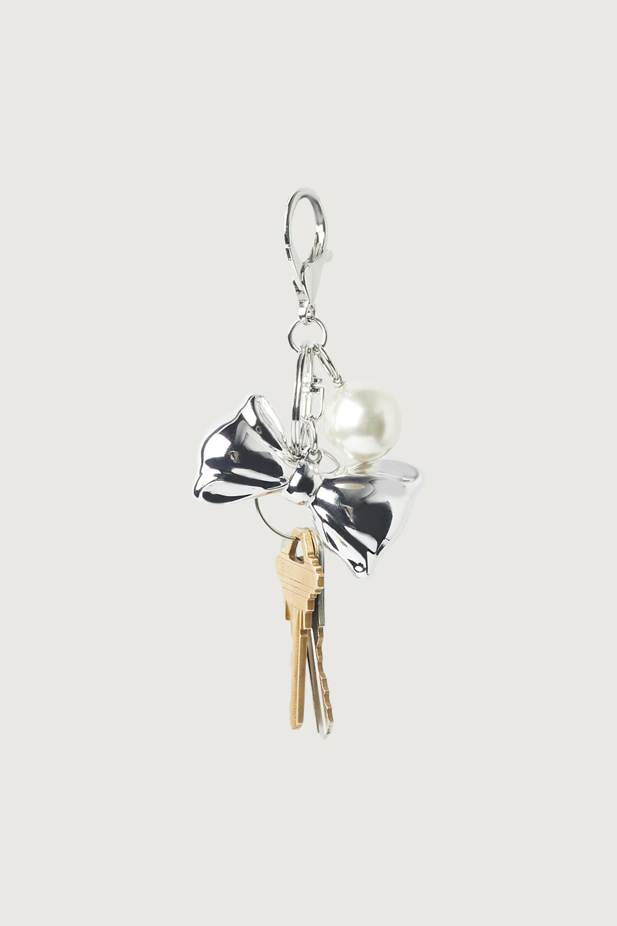 BOW AND PEARL BAG CHARM