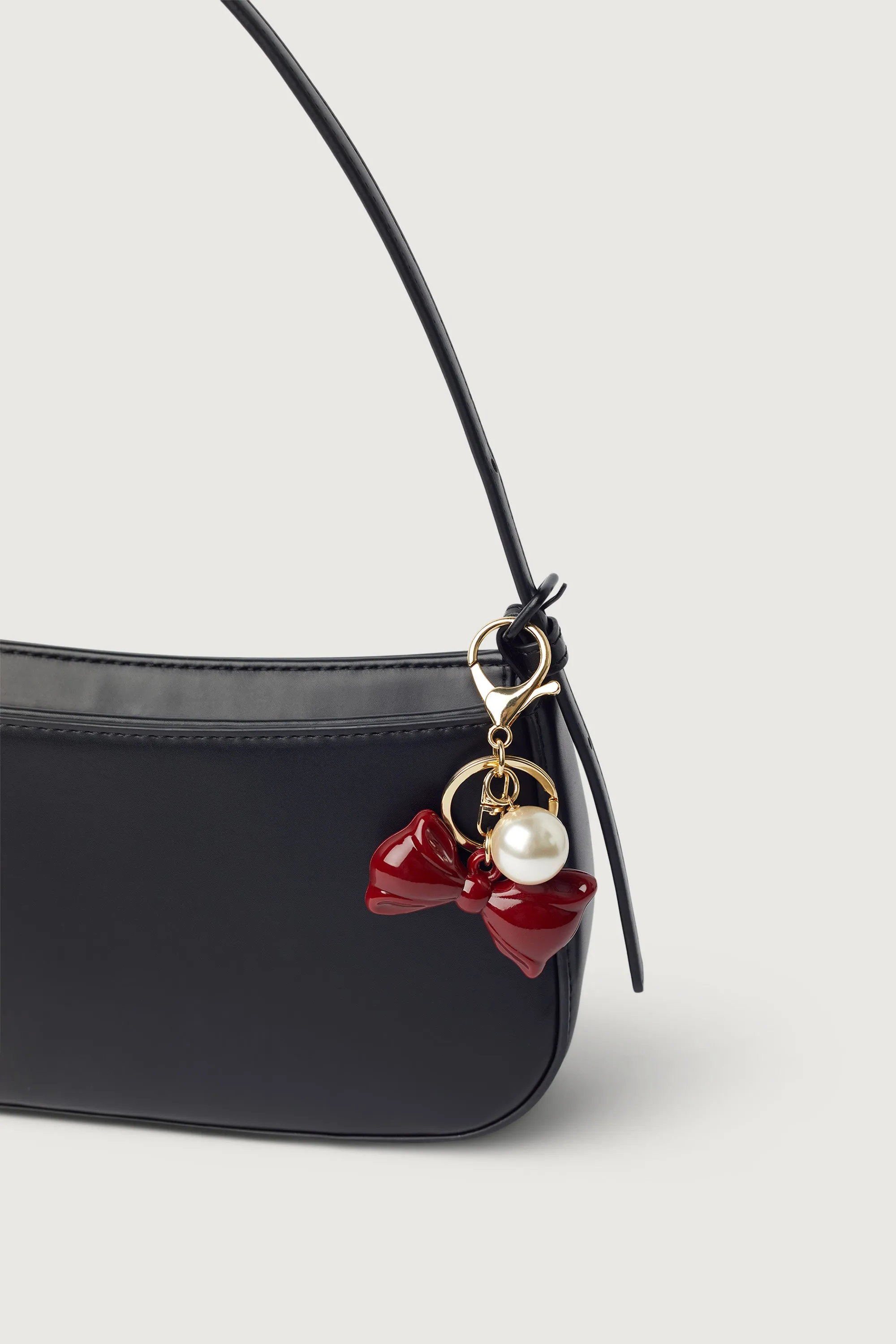 BOW AND PEARL BAG CHARM